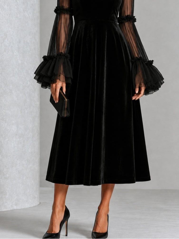 Stefania | Robe midi plissée en velours noir et tulle transparent