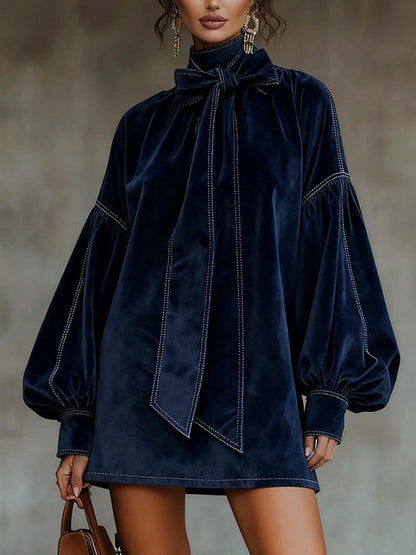 Carolina | Vestido de ante con cuello alto y flecos